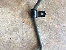 I did an engine swap on my 99 mustang GT and at some point took this off. I can not tell where it goes or what it is. It is a metal line and looks to be a vacuum line maybe?? Any help would be appreciated thanks.