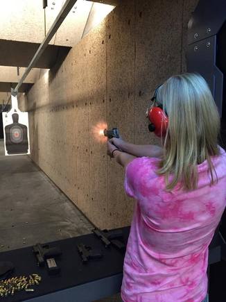 Becky trying out my Colt Defender .45