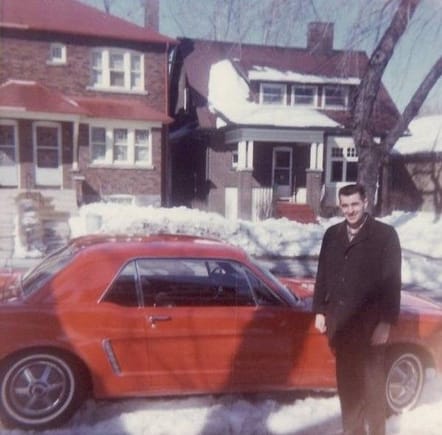 My dad and his 64 1/2 coupe. 289, 4V, automatic with air conditioning. This picture was taken in January 1966 in front of his house in Toronto, Ontario. He kept the car until 1979, when he traded it for a new Camaro Berlinetta. I think he should have kept the Mustang...
