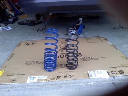 Ford Racing M-5300-N rear spring (left). Original stock spring (right).