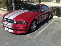 mustang gt 06 with body kit and custom rims.