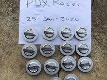 I've got a set of center caps for these wheels (and the two other sets I'm selling).