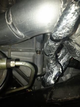 2.5" pipe going past the empty spot of the starter motor