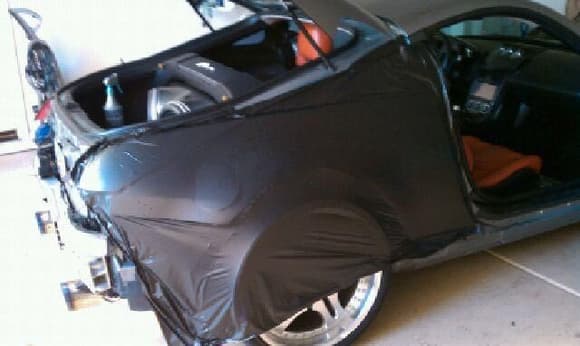 the beginnings.. wrapped by AZVinyloverlays.com.. thanks Jimmy. ( In his garage) after fenders cut at Intense Motorsports.