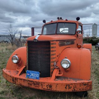 Non-working 1948 Diamond T flatbed truck-salvage