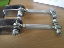 Rose jointed rear drop links for rollbar