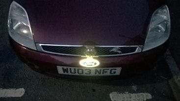 New light up Ford badge and ruining light