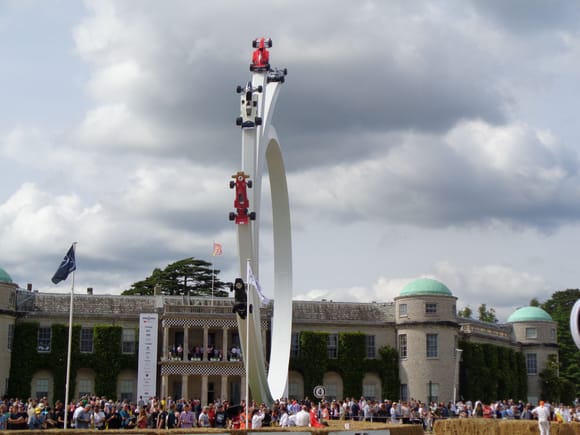 Goodwood House with the F1 cars statue.