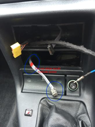 Probably power IN to CD player, will only fit one place