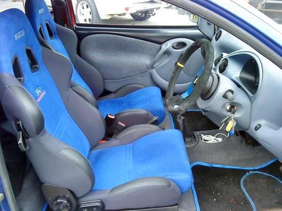 racing puma seats, omp steering wheel, carbon vinyl on doors. filp out screen, colour coded matts, richbrook ford gear nob