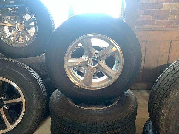 205/75R15 Tires on Aluminum Rims for Sale $210