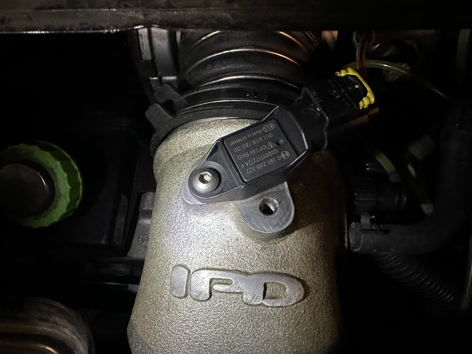 Current condition of rubber coupler to Y-Pipe; the gap is as small as I can make it, and the flange is longer than you may think, so hoping that its not leaking here.