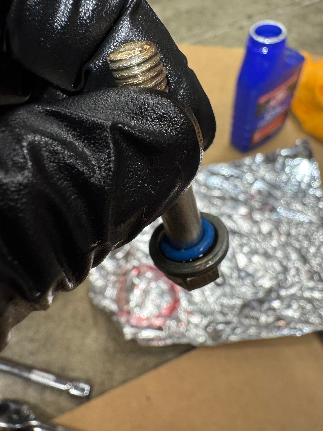 111 applied to all 4 o-rings and around the outside of the pump where it contacts the block