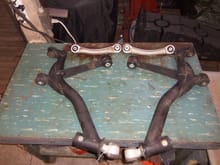 Completed upper and lower control arms for the rear suspension on the Red Witch.