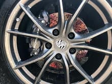 Sonax Wheel Cleaner was used.  Dealership used too much tire dressing and this seemed to do the trick and make them clean.