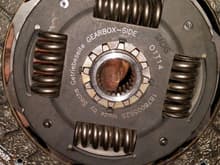 The clutch disc is labled "gearbox-side" meaning this spring side should be facing the pressure plate right?