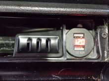 twin USB outlet -- this one has digital voltage readout too -- seems to match the dash reading too!