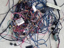Here is all the aftermarket wiring that I removed from the car.