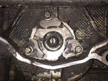 Is this residue from RMS?  Cleaned it all up (dont have a pic) late last night and will check today if there's any leaking around IMS flange.  However, when cleaning, noticed that the lower right bolt on flange was very lose (could turn it with my hand).  As I unscrewed it, some oil poured out.  I'm thinking I need to order LN retrofit but don't have CAM locking tool needed before I remove flange today to try to determine what bearing I have here.  All thoughts or suggestions appreciated.  