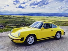 1976 911S in Light Yellow. 3.2 liter transplanted engine from an 89.  Currently in for a complete "restore". Will come back out of the shop with Carrera flares, new paint, new interior and new Fuchs.