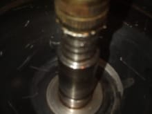 shaft: the brass at the top is the center of the impeller(plastic impeller broken off, then seal area, then roller inner race, then the groove for the ball bearings
