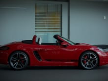 Carmine red with Porsche side script in black