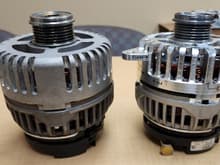 New alternator front housing side by side with original custom housing.