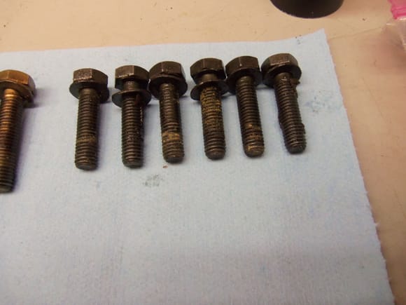 Primary pump mounting bolts. Are these supposed to have some kind of sealant or locking compound on them?
