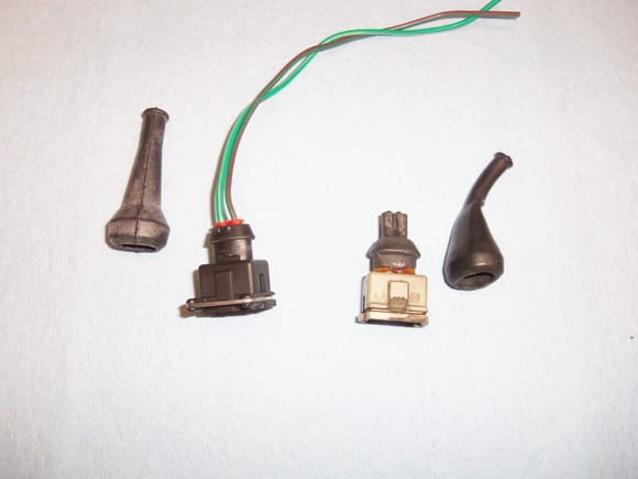 Boots removed from both connectors.
