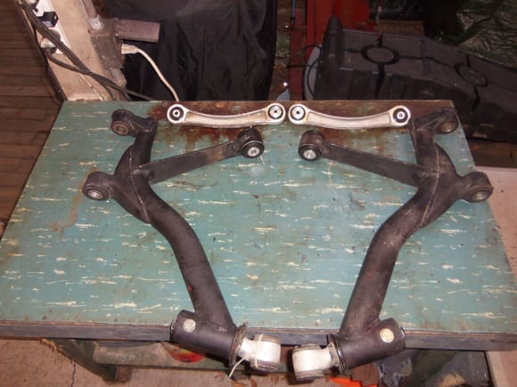 Completed rear upper and lower control arms for the rear suspension.