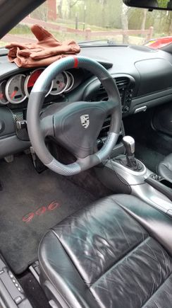 As a final update, here's a picture installed with the airbag from Dallas steering wheels.   I think it looks good with my seal grey center console and carbon fiber trim pieces.   Don at dallas was great to work with and had everything back to me in under a week.  Now i have am extra alcantara airbag cover and module.  Anyone interested?