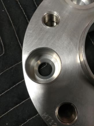 Larger holes are those used to mount the spacer to the wheel hub with the special bolts (included).  Smaller threaded hole is wheat your wheel lug bolts thread into when mounting the wheels to the spacer.