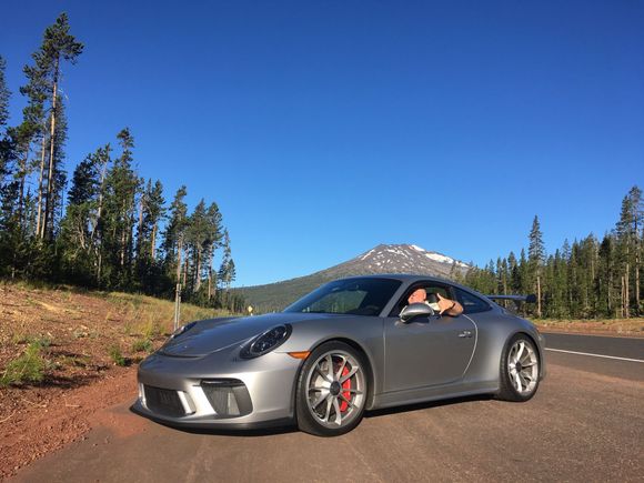 My freind Mark driving the car with Bachelir in the background. 