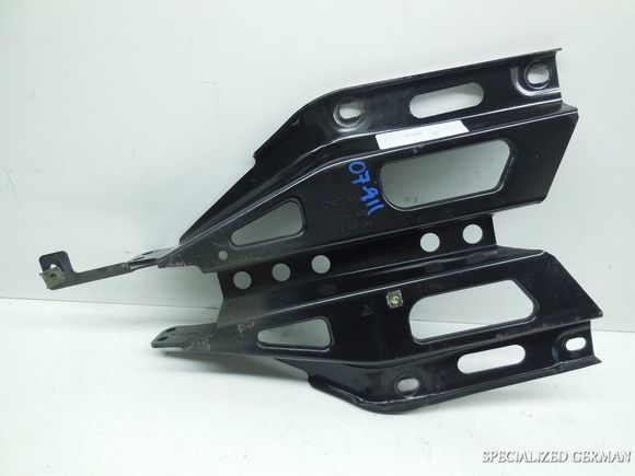 This is a 997 carrier bracket (not a 100% sure). Notice the squarer bottom and the longer piece is on the right side.