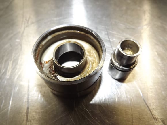 32 valve cam follower with top cut off. Easy to see the 6mm deep reservoir which collects sludge and debris from engine failure.