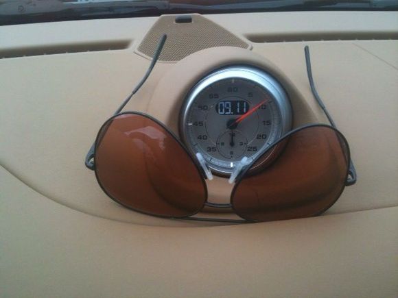 Holds the sunglasses & reminds me I'm in the 911 :)