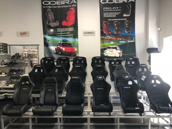The line-up at HMS Motorsports.  A great resource.  Unfortunately the Cobra Classic isn't pictured here, possibly because it would be dwarfed by the other seats.  The Cobra Nogaro is in the second row, second from the right.
