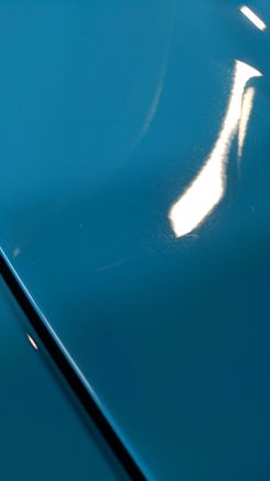 Polishing pig-tails on the rear lid from the factory.