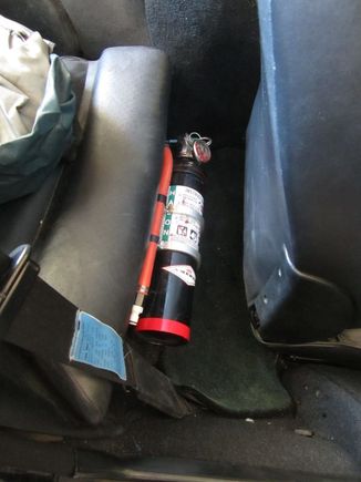 Same Extinguisher mounted on alternate B-K mount behind front pass seat