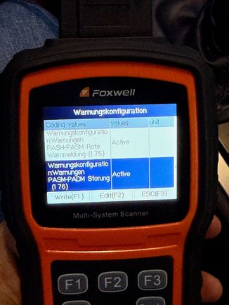 Playing again with coding, I found this setting in the instrument cluster, which basically prevents the fault to be displayed on the dash. This seems to be the ticket, as coding out PADM seems tricky, unless you have a DSC controller. It seems a specific version of PIWIS is needed (not the latest). The fault can be present and doesn't affect anything (PASM / PSM etc.)
