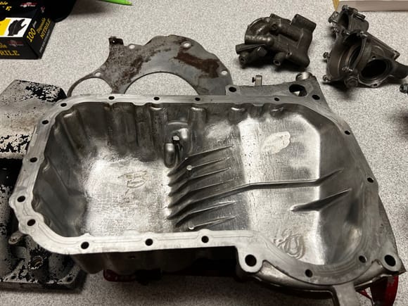 Tons of casting slag inside these oil pans, didn't realize the OG 1.8t pans were like this, shit will cut you. 