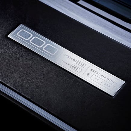 Issue 1 in hard-cover, detail; aluminum "VIN plate" is individually numbered