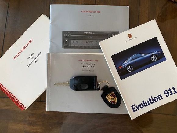 Original manuals included in glove box pouch. All available service records will be provided. And for those wanting technician service manuals, these are also included. Car cover, bra and mirror covers, and headlight shields are also available.