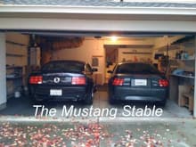 2005 Mustang GT with his stable mate the 2001 Mustang GT Bullitt