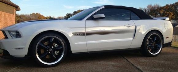 Lowered, new wheels, discs all around, clear front fender lights.
Got GT500 rear splash guards, deck lid panel &amp; OEM hood scoop next.