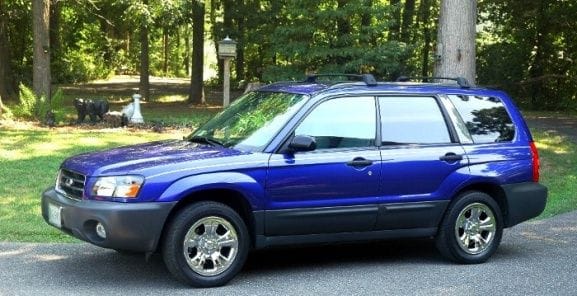 Wife Unit's 2003 Forester 5 spd bought in 2007 with 55K miles had damaged RF fender and hood and estimated $4400 repairs, I got it cheap as prior original owner had cancelled insurance two weeks before damage.   I bought parts, farmed out paint, fixed for $2K and change, car has been absolutely faultless and is now at 98K and in Spring 14 will get new timing belts and good tune.