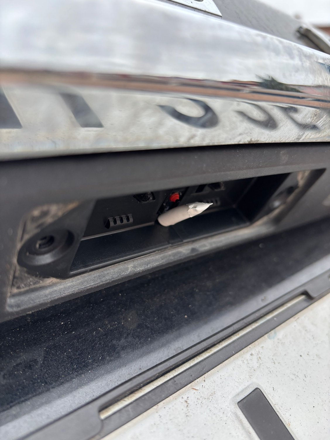 Added some extra tape to the spring pushing the opening button 
