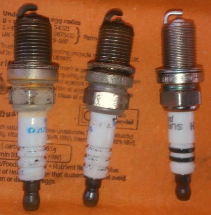 Old and new spark plug comparison