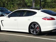 Thule roof racks, wind noise minimal, I only open sunroof up, not back due to it being louder