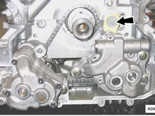 Oil pump chain drive and tensioner/guide